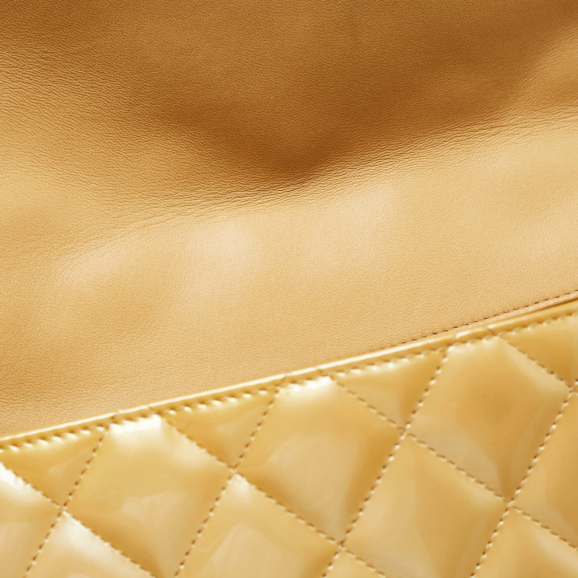 CHANEL Gold Quilted Patent Leather Maxi Classic Single Flap Bag