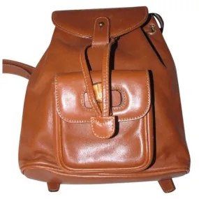 Gucci caramel brown colored leather, two strap, petite, drawstring top, multi-pocket, messenger bag/backpackk